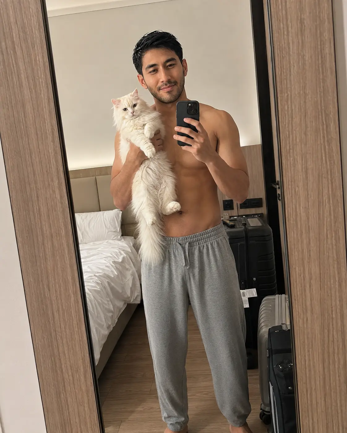 Mirror Selfie with Cat in Hotel